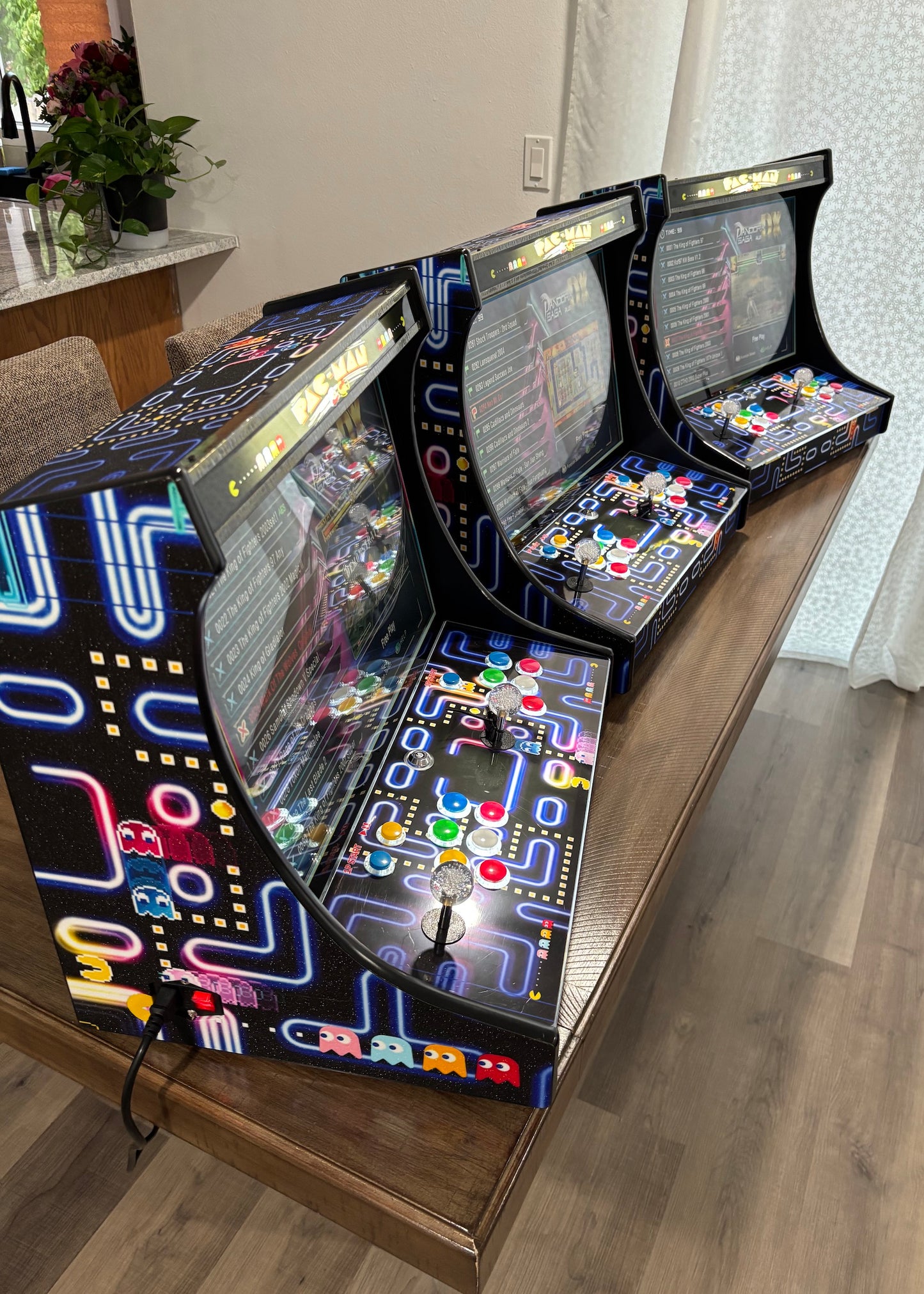 CherryQuest 22-inch tabletop arcade machines arranged on a table, side view